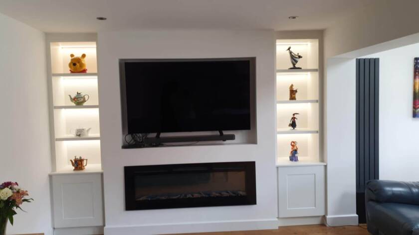 Media wall with shelves either side